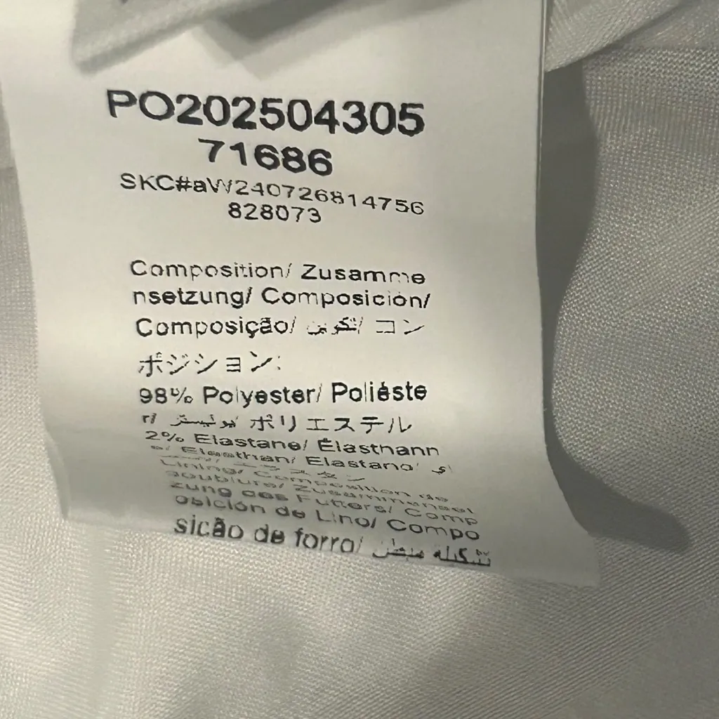 White Sleeveless‎ Dress with Floral Texture and Ruffle Hem Size M - Image 6