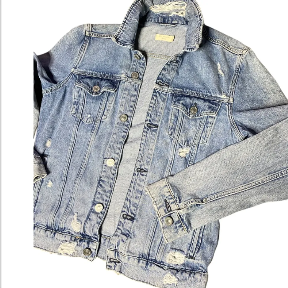ALLSAINTS
Distressed Light Wash Denim Jean
Trucker Jacket Medium Unisex - Image 8