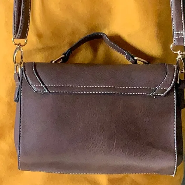 Go with every thing purse in brown with unique front latch and removable strap. - Image 4