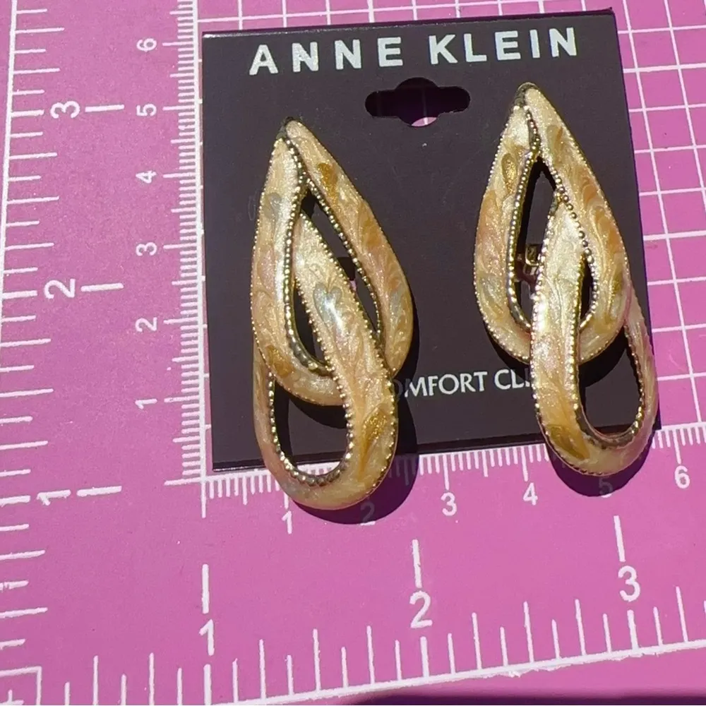 Anne Klein gold tone beige cream reflective amber double cross teardrop earrings - Image 5