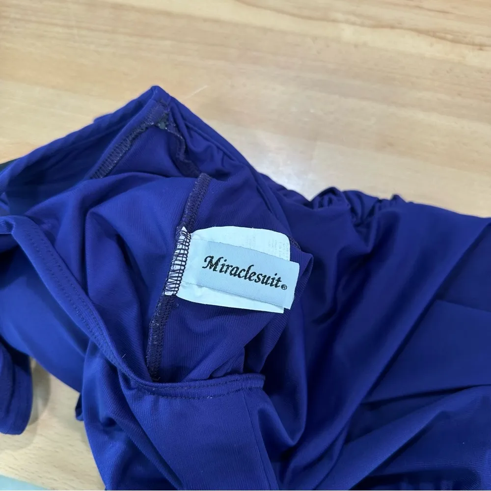 Miraclesuit Blue Criss Cross Escape One Piece
Swimsuit Slimming Underwire - Image 5