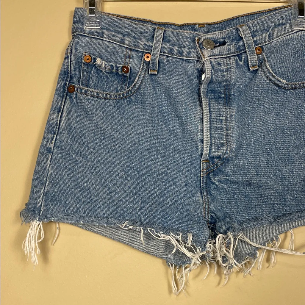 Levi’s Premium Women’s 501 Distressed Raw Hem Light Wash Button-Fly Denim Shorts - Image 2