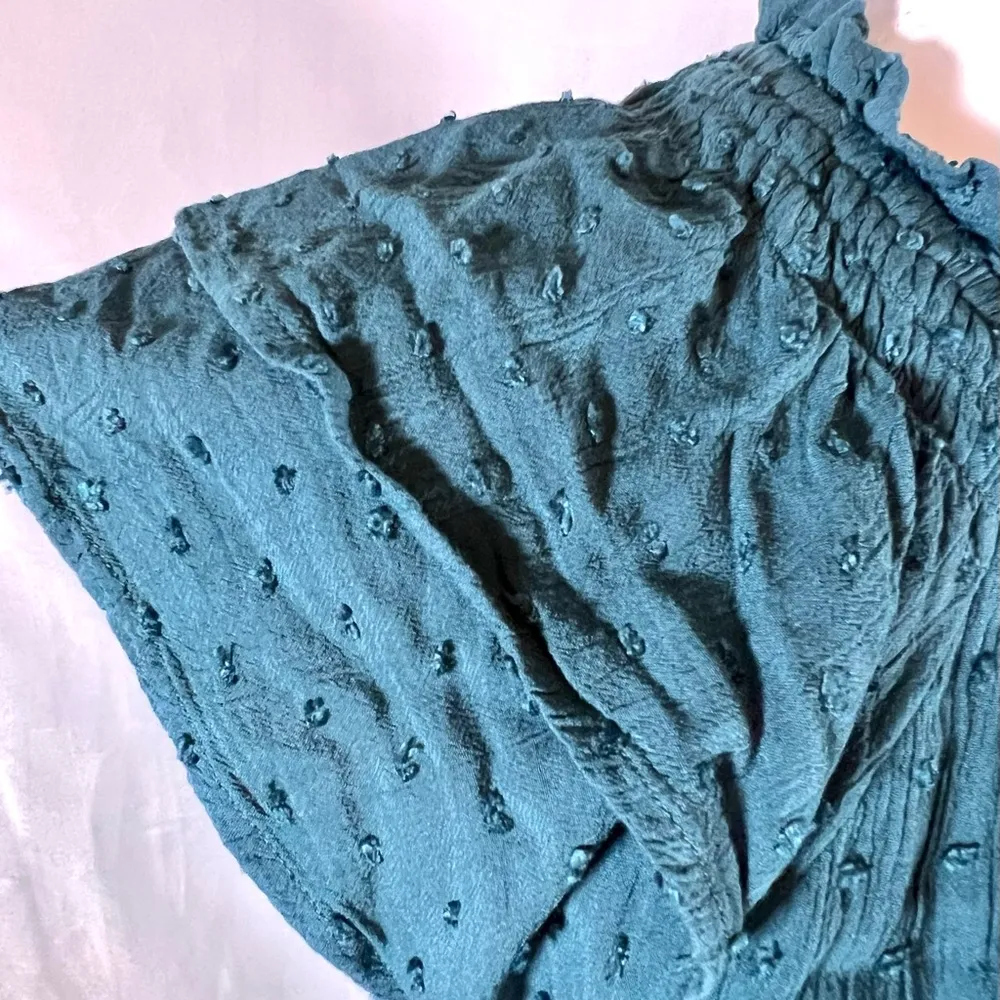 teal green Swiss dot romper with pockets size large - Image 8