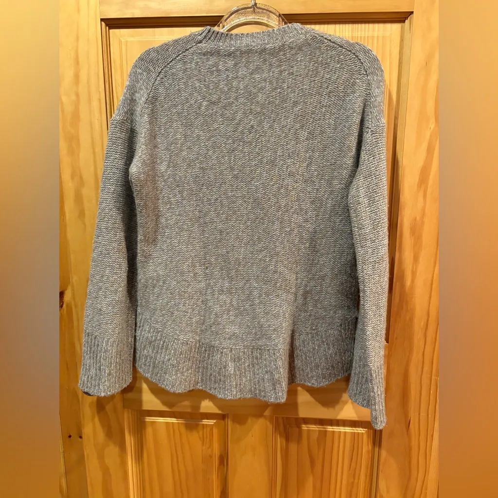 Theory knit crewneck sweater in various shades of brown and beige. - Image 2