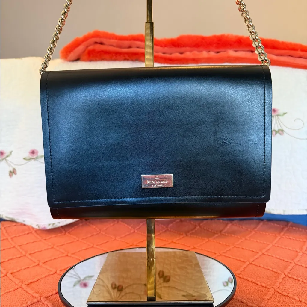 Beautiful black exterior, bright pink interior shoulder and crossbody purse.  - Image 3