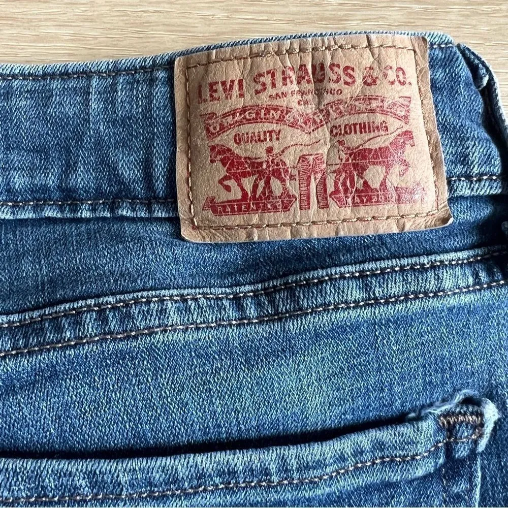 Levi’s 535 Super Skinny Frayed Jeans Size 32 Front Seam Raw Frayed Hem Mid Rise - Image 10