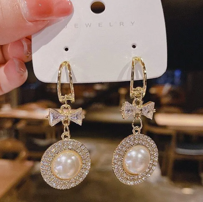 Women's Crystal Bow White Pearl Drop Dangle Earrings - Image 3