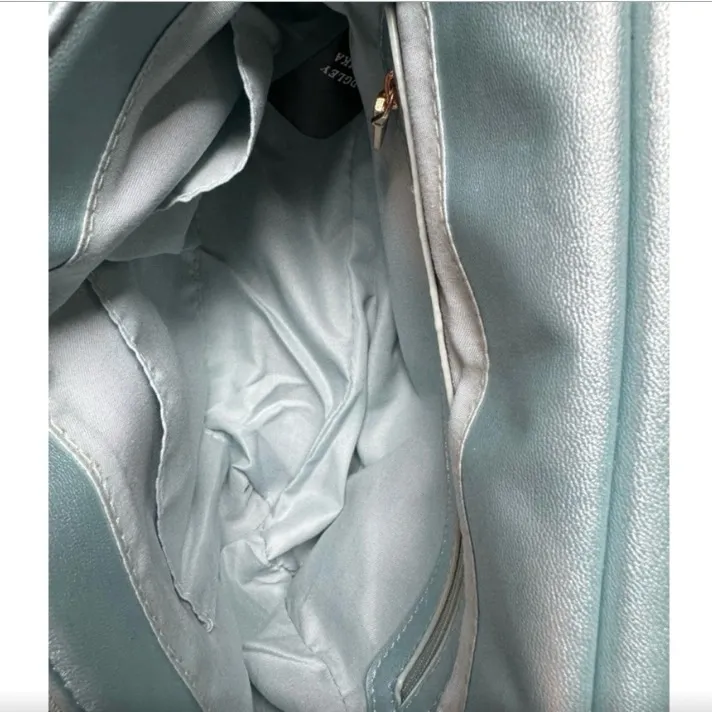 Light and ethereal quilted convertible crossbody rests like a dream on your arm - Image 8