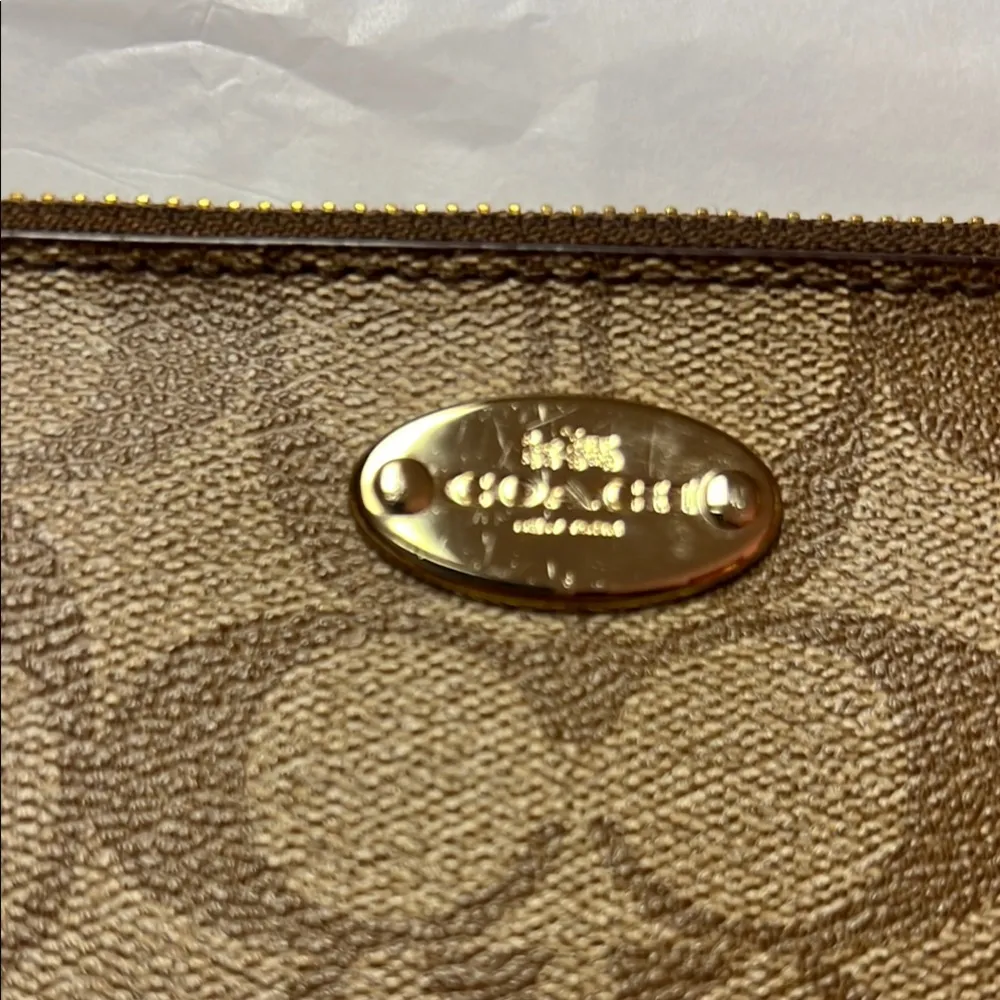 Coach Brown Clutch with Monogram Pattern and Zipper Closure - Image 2