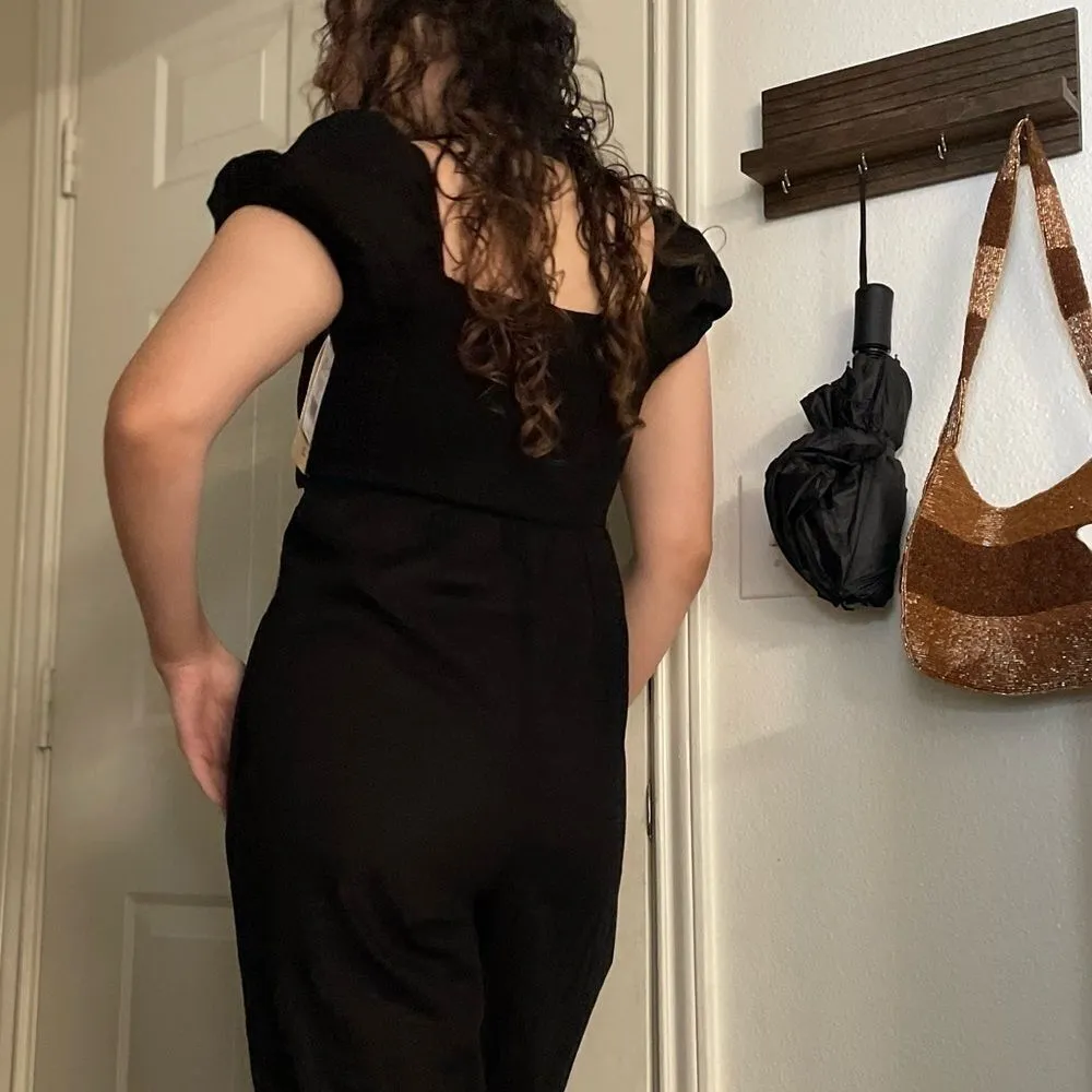 Rewind front tie cut out jumpsuit puff sleeves size small‎ Black - Image 3
