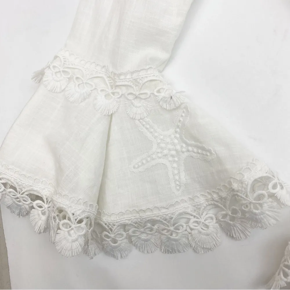 Waimari Calamaro Tiered Ruffle Smocked Beach Coastal Bridal Mini Dress: White - Image 11