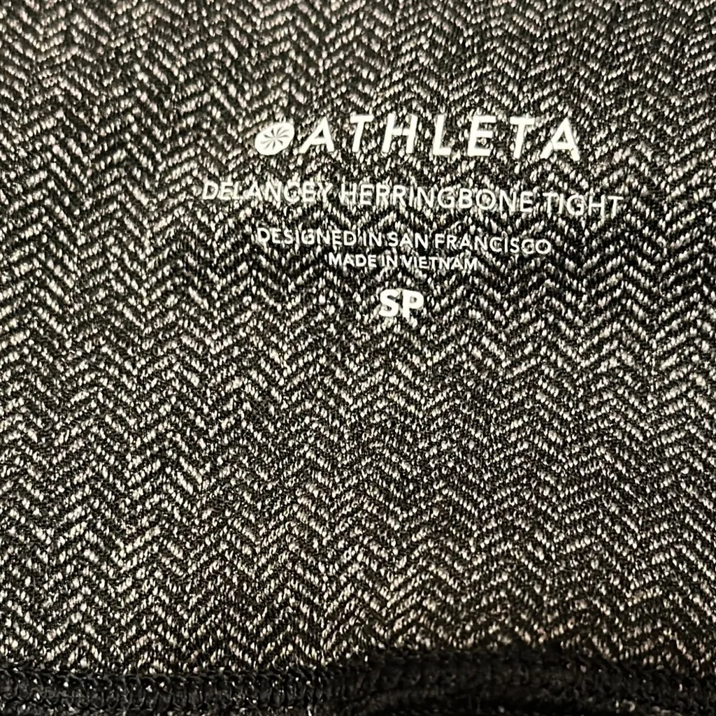 Athleta Delancey Herringbone Tight. 2 Zip Rear Pockets. 1 Waistband Pocket - Image 9