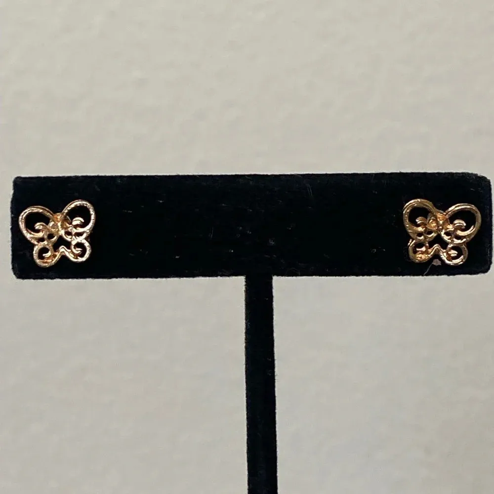 Tiny gold butterfly stud earrings - Image 6