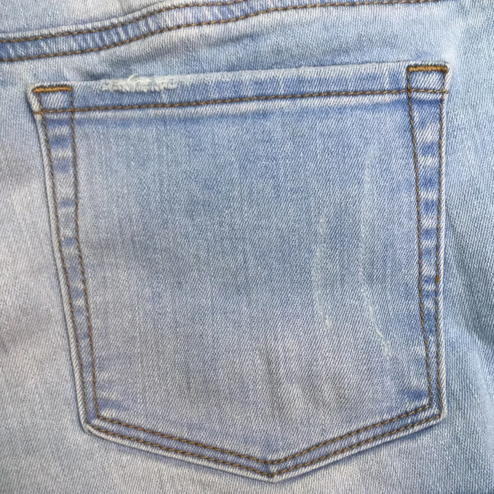 Women’s High Rise Super Stretch Shortie Light Wash Rolled Hem Shorts - Image 5