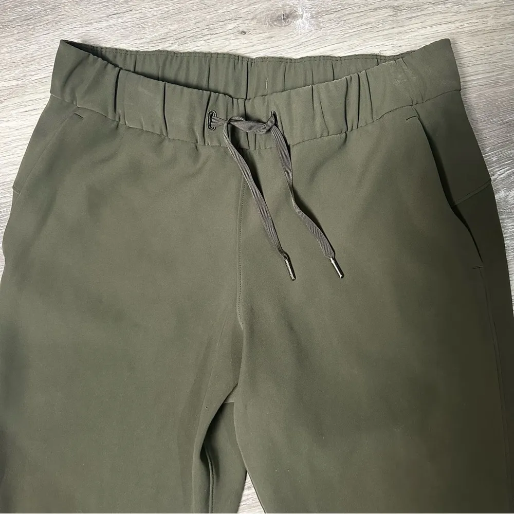 Lululemon On the Fly Crop Woven 23" Dark Olive Green Pants - Image 6
