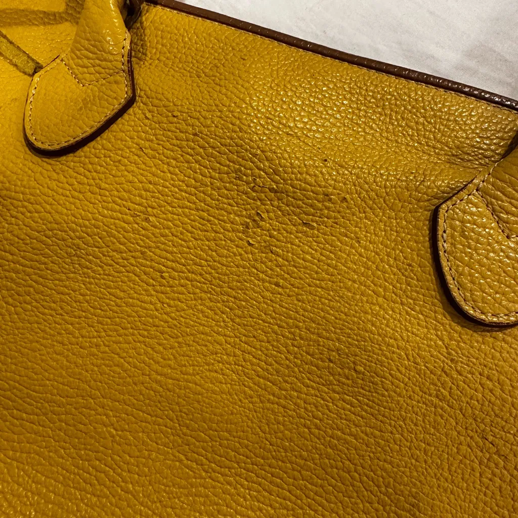Sundance yellow pebbled vegan leather tote Bag with brown stitching and tassels. - Image 10