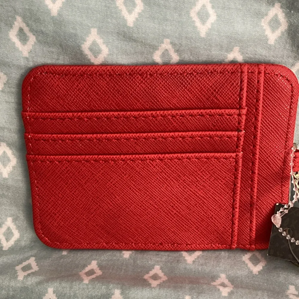 XOXO Red Card Holder. NWT 5” Long x 3 1/2” Wide.  Zippered pocket in front. - Image 2