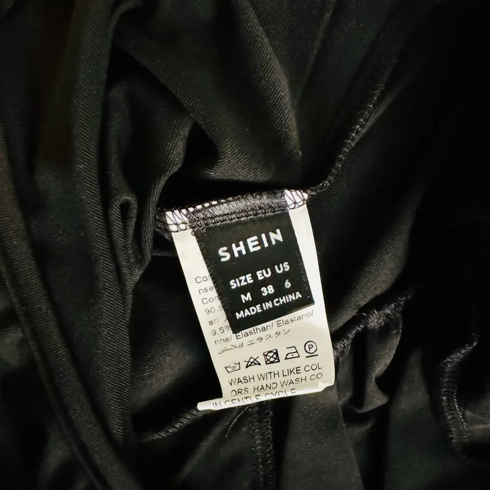 Ruched Front Backless
Straps Bodysuit
Black / 6(M) - Image 6