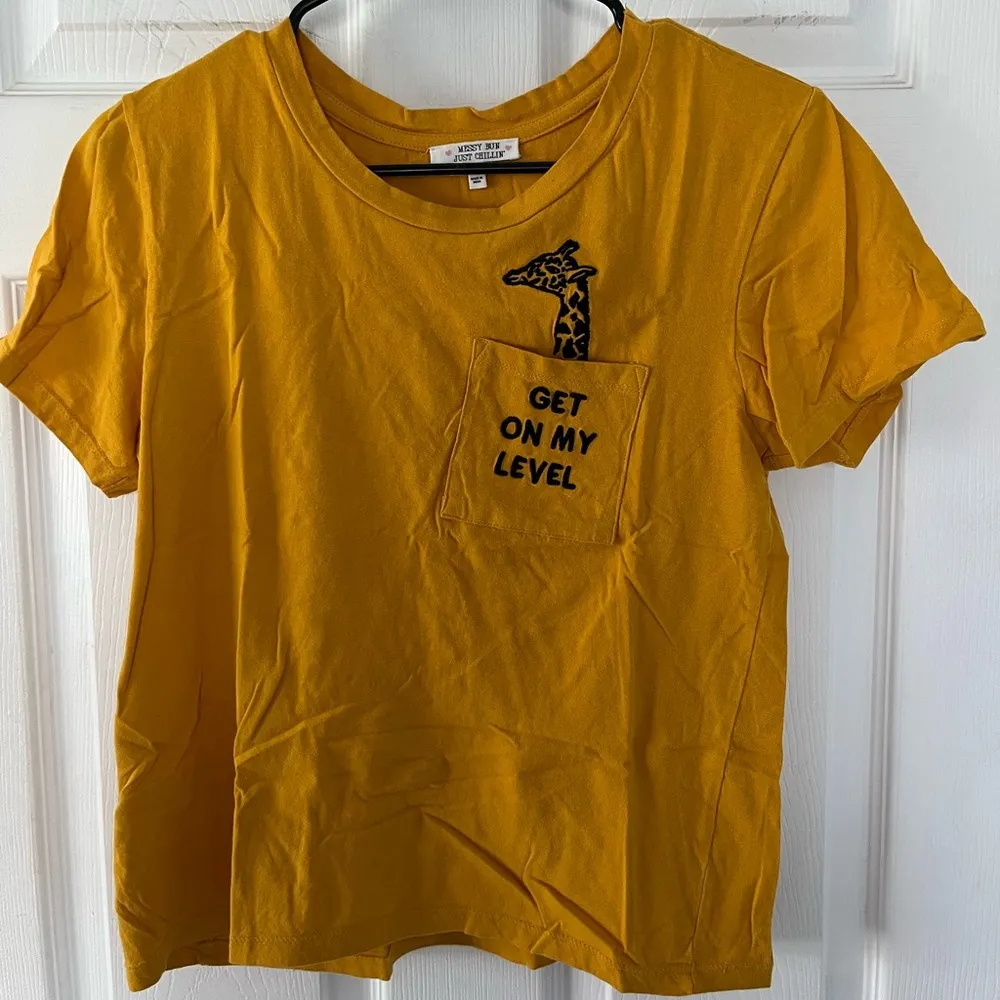 Marshall’s mustard yellow T shirt. - Image 3