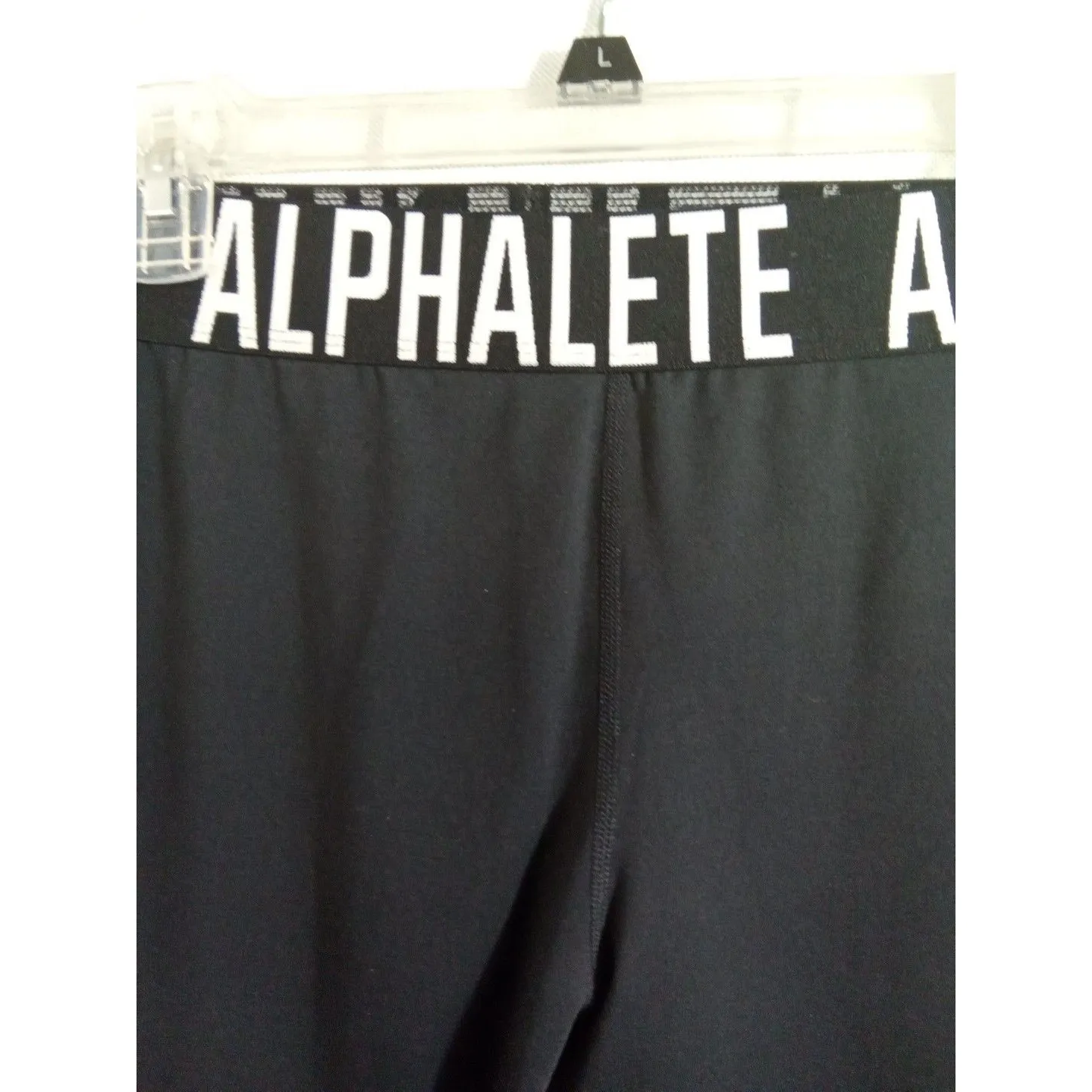 Alphalete‎ Women’s Spell Out Waistband Criss Cross Cutout Black Leggings - Image 2