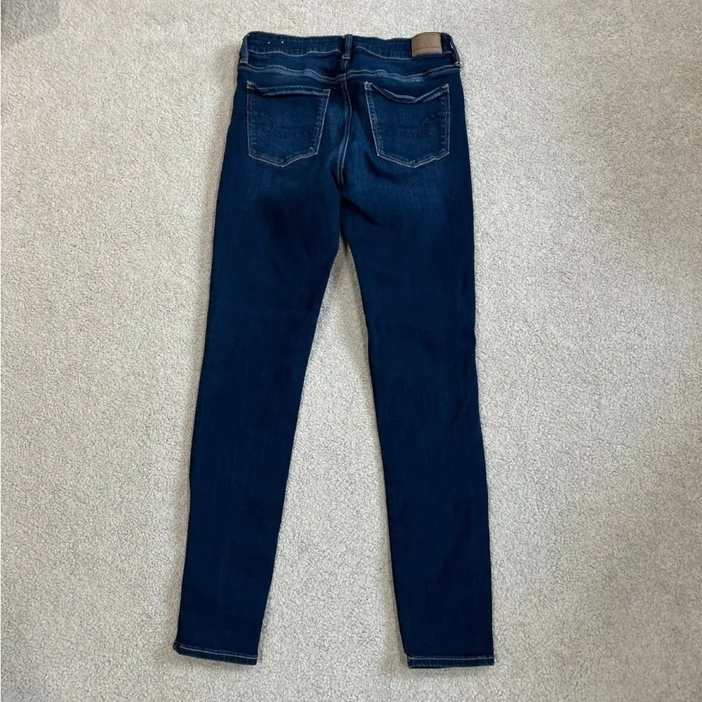 American eagle next level stretch dark wash solid blue jeans in size 10 long - Image 3