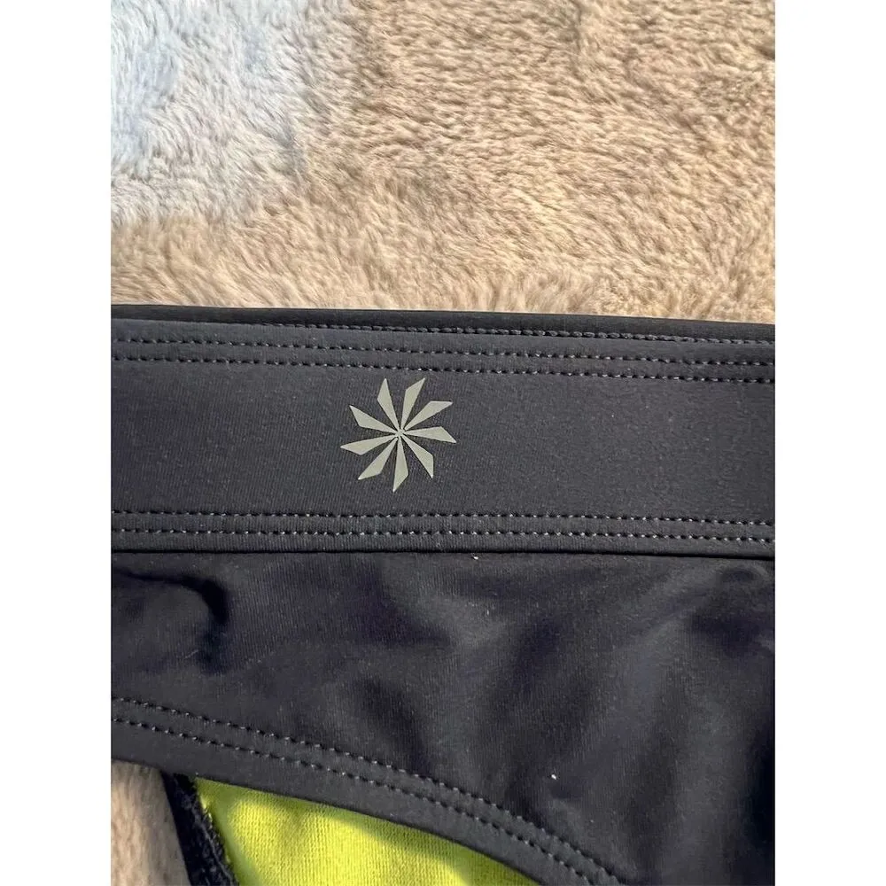 Athleta Women's Black Bikini Bottom Size M Neon Green Lining - Image 2