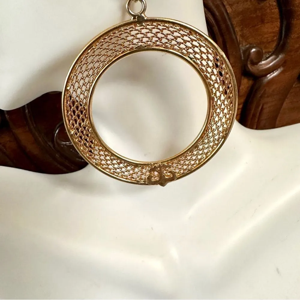 Gold tone fleur de lis round statement earrings - Image 3