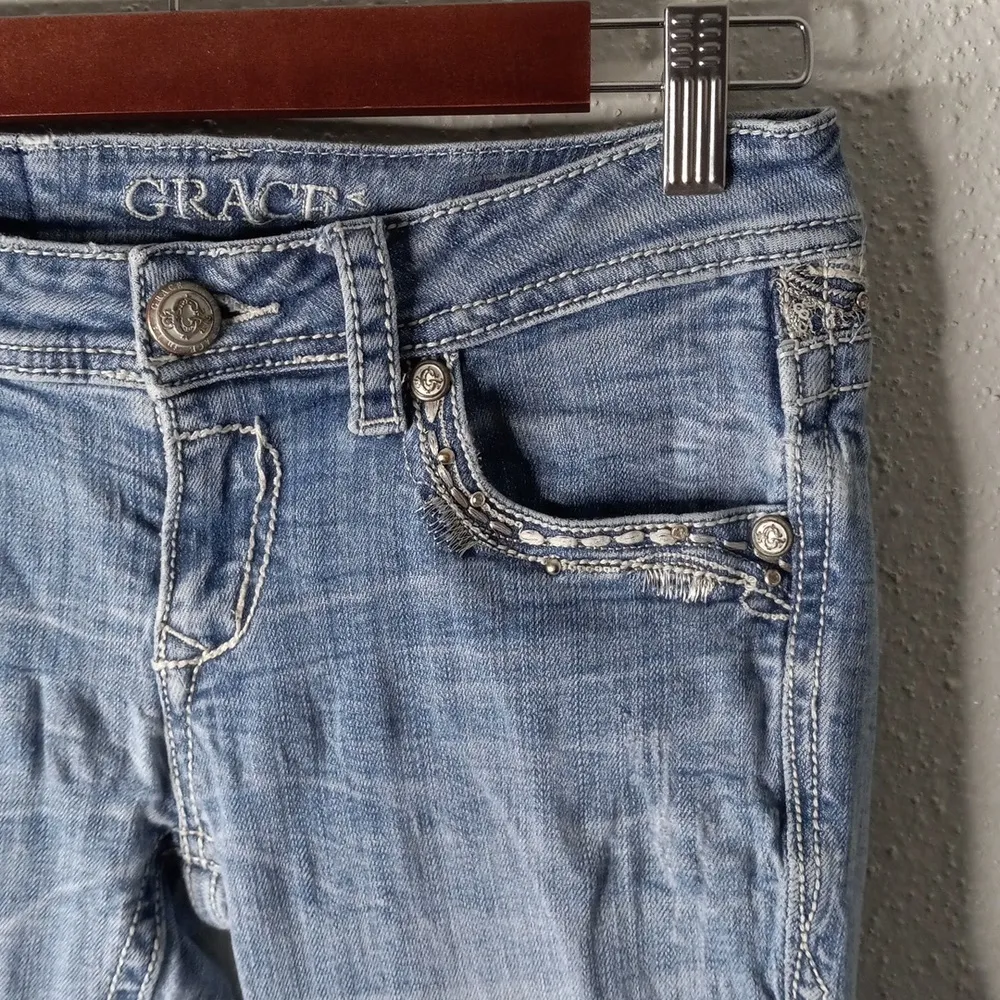 Grace in L.A. 26x32 Distressed Rivet Flap Pocket Light Wash Jeans - Image 4