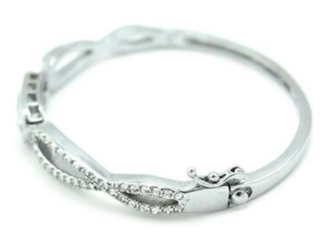 Lia Sophia “Maiden” Silver Tone Infinity Crystal Hinged Bangle Bracelet - Image 1