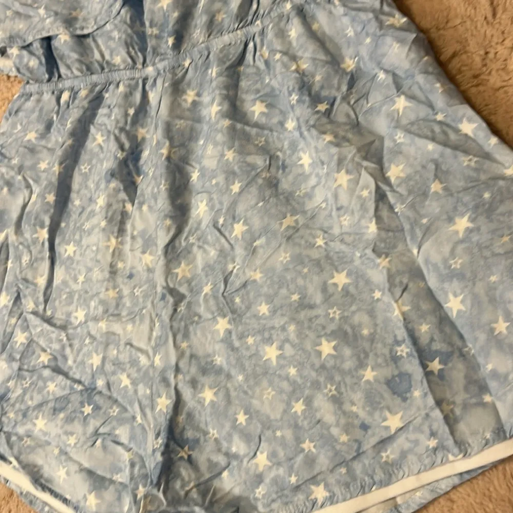 Star print romper in size L Size L - Image 7