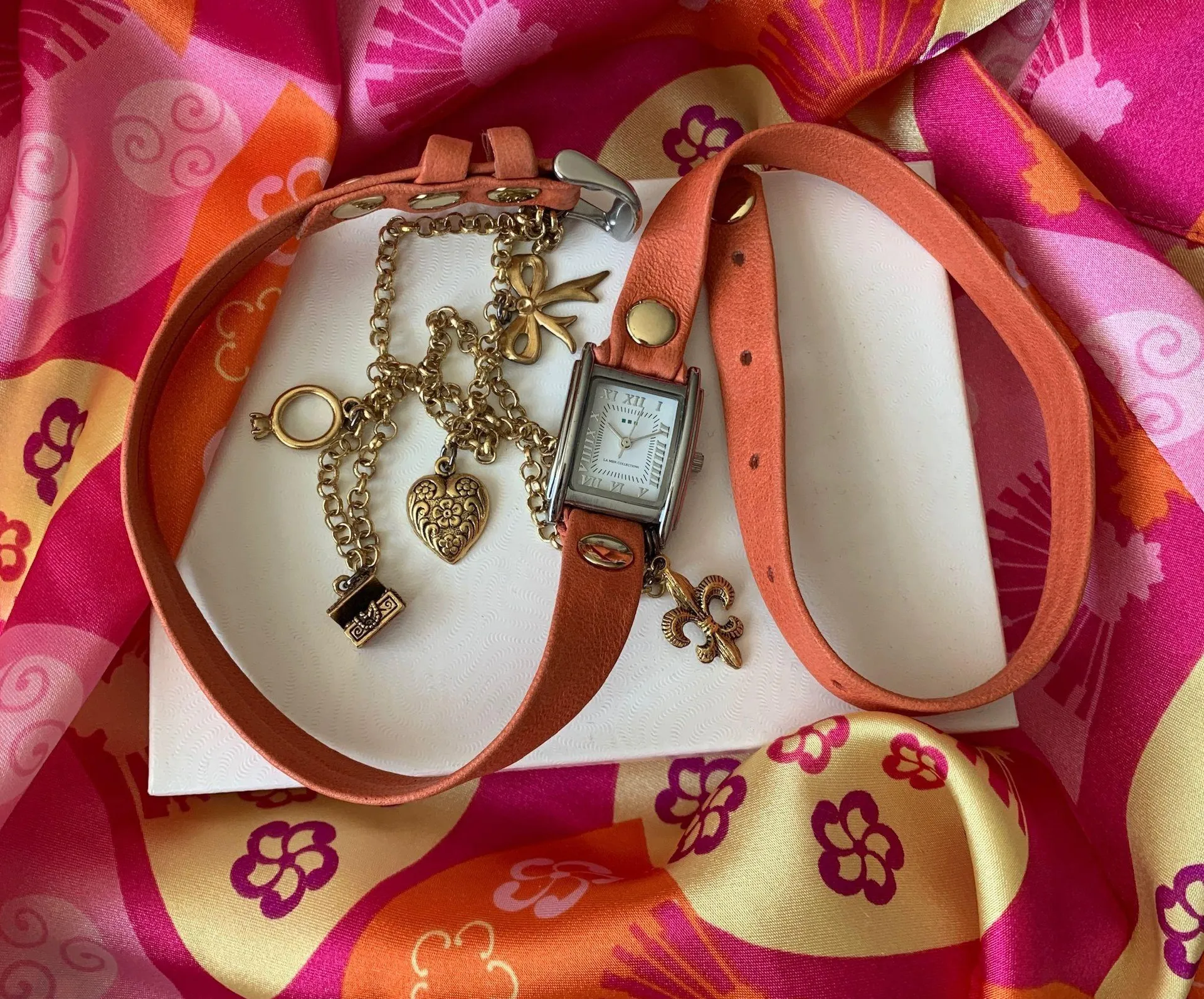 La Mer Coral Silver Toned Wrap Watch with Gold Chain + Charms accents Orange - Image 2