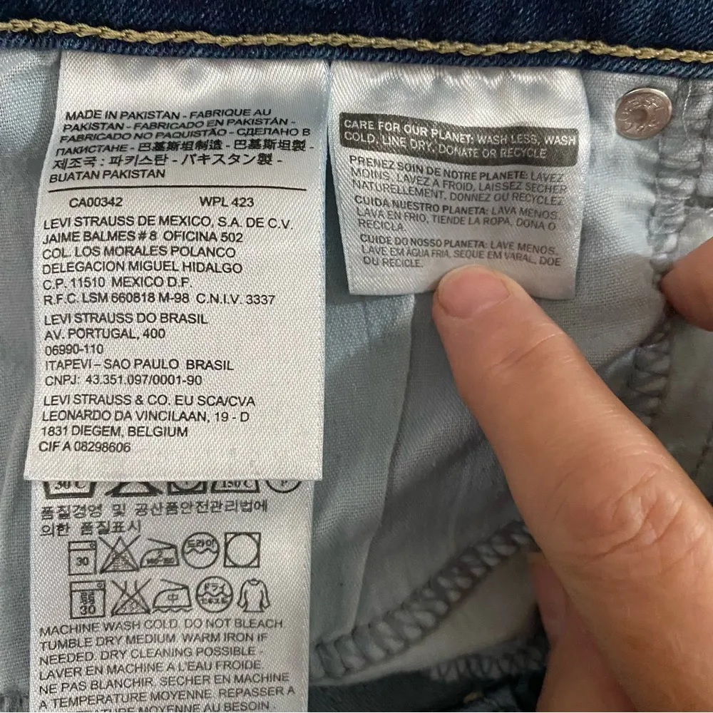 Levi’s mid rise medium wash vertical fade crease legging skinny jeans size 31 - Image 13