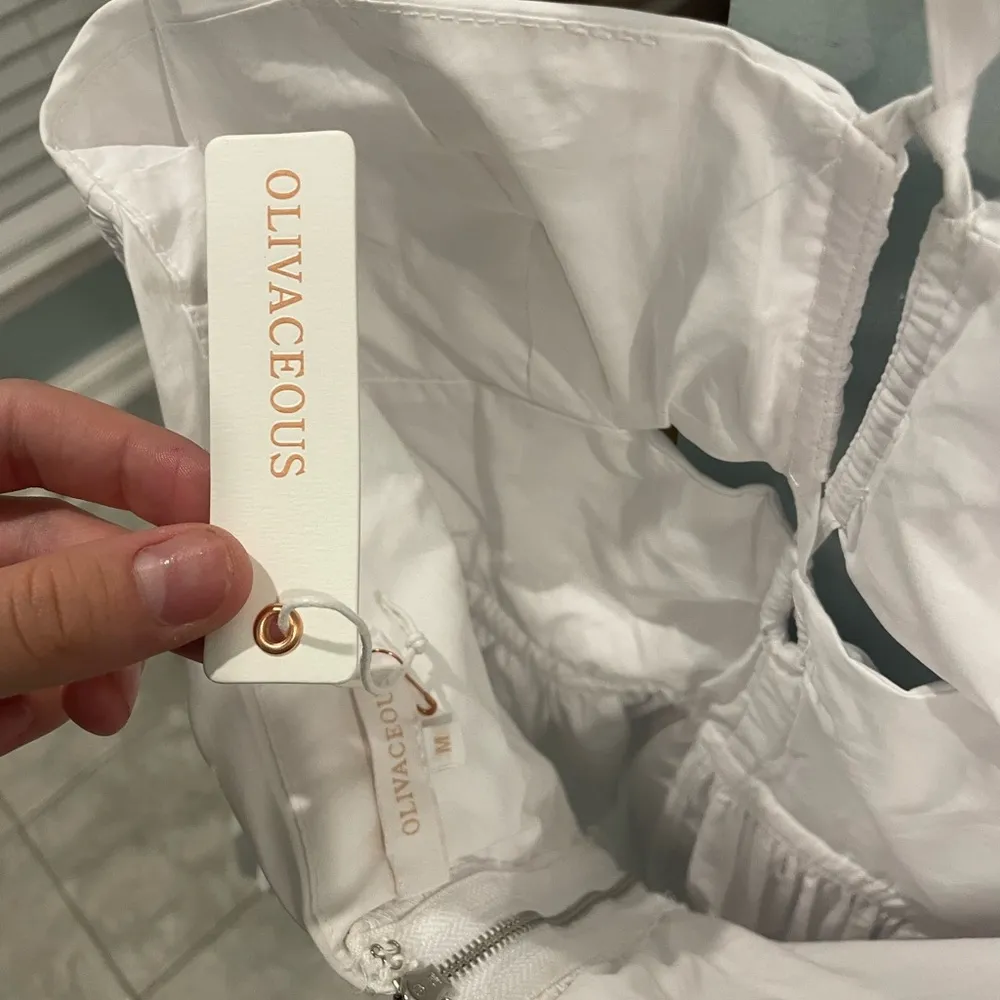 white halter tie romper with cutouts - Image 4