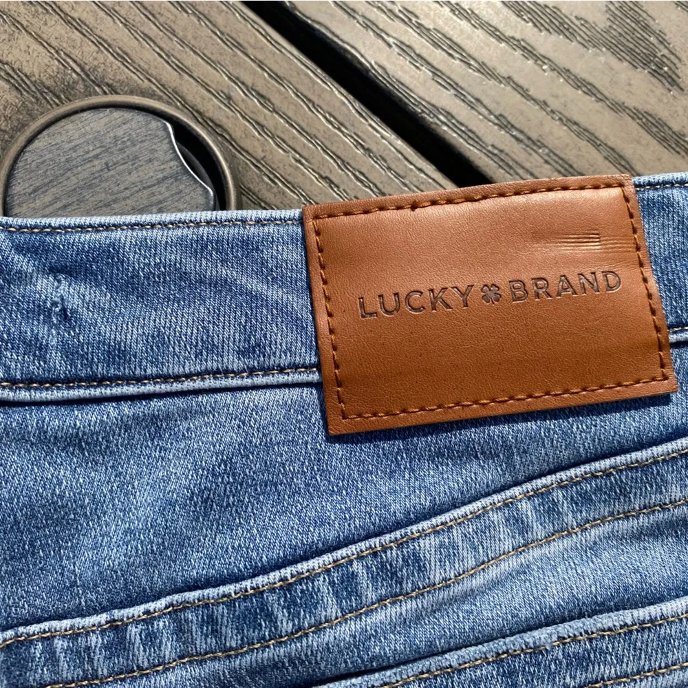 Lucy Brand low rise distressed short 8/29 medium wash cut offs denim - Image 2