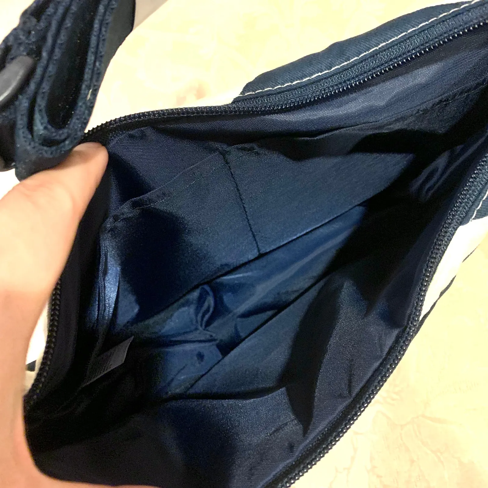 Uniqlo x Marimekko Wave Printed Round Shoulder Bag in Navy Stripe - Image 5