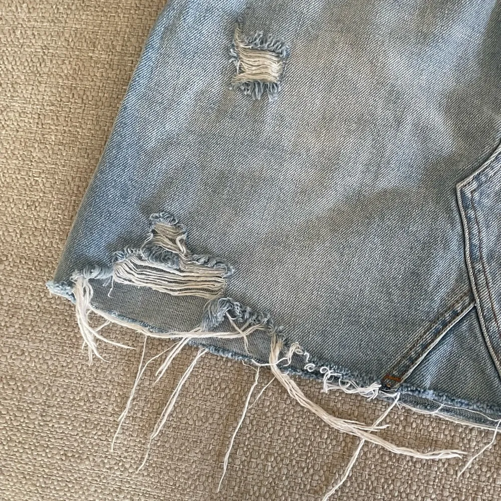 Urban Outfitters BDG Size Medium Light Wash Distressed Denim Skirt buttons - Image 5