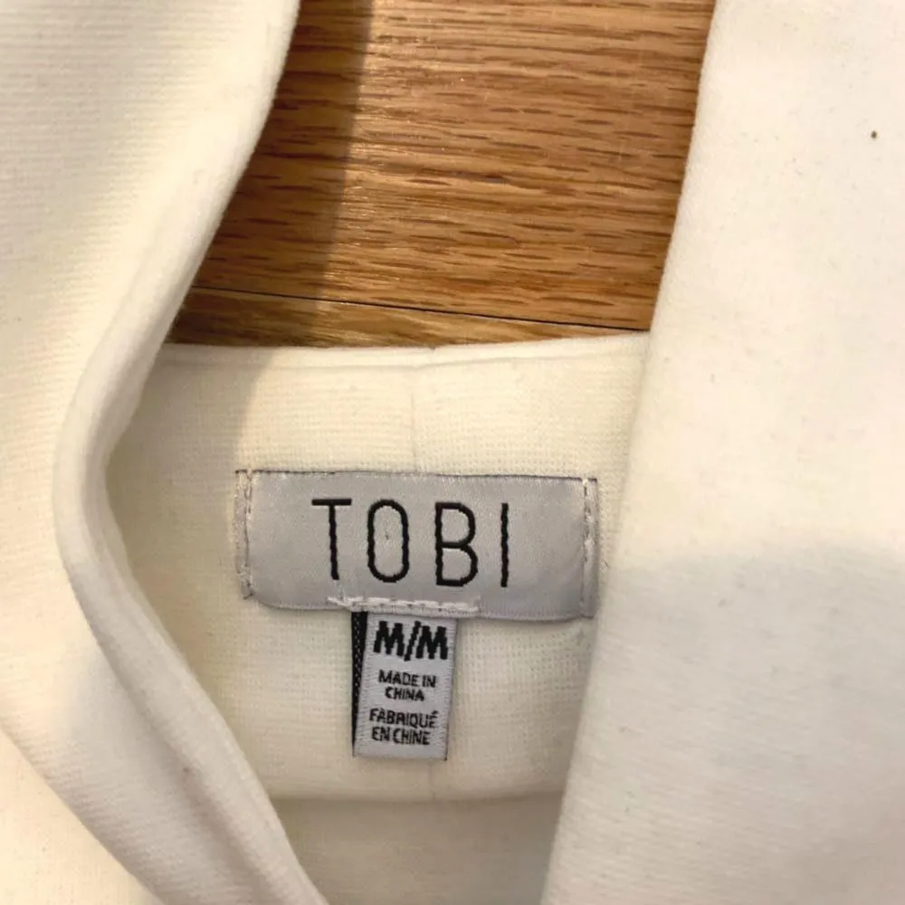 Tobi NWOT  White Cut Out Bodysuit - Image 7