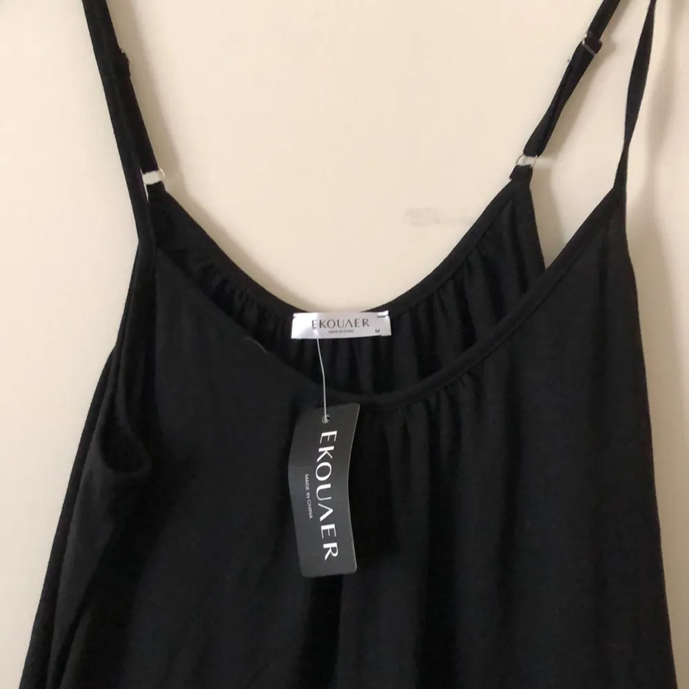 One Piece Women’s  hotshot romper black medium pockets comfy oversized - Image 3