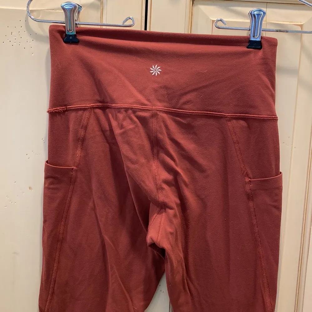 Athleta stash pocket salutation tight - Image 3