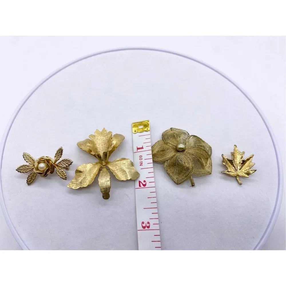 Gold floral
Filigree and gold toned 4 piece brooch set Gold - Image 7