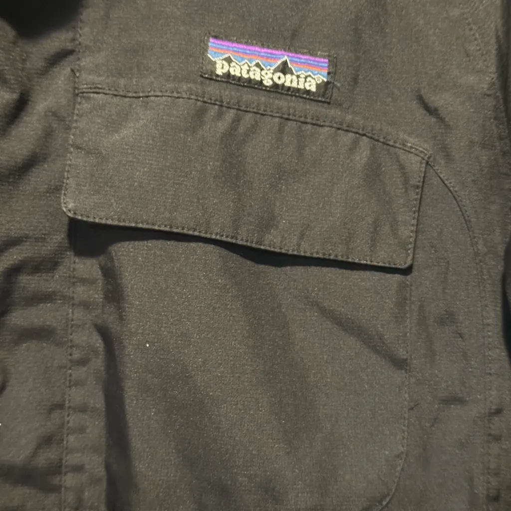 Patagonia women’s rain jacket size M black hooded - Image 3