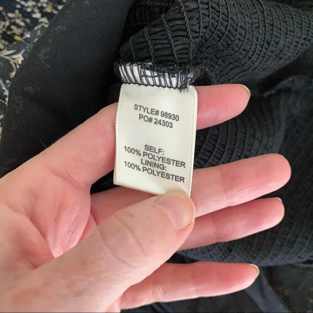 Skies Are Blue Ditsy Floral Smocked Mini Dress in Black - Image 6