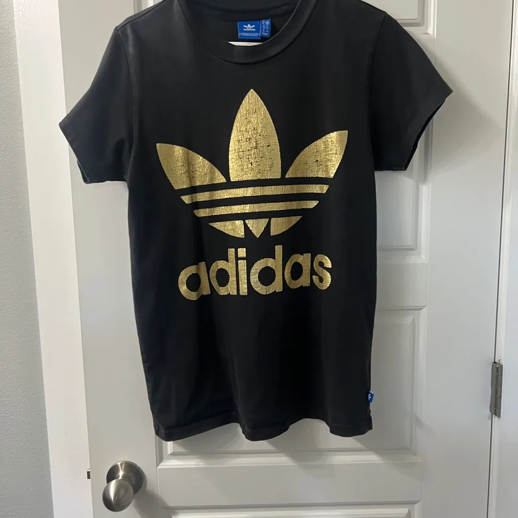Adidas Women's Black and Gold Logo T-Shirt size small - Image 2