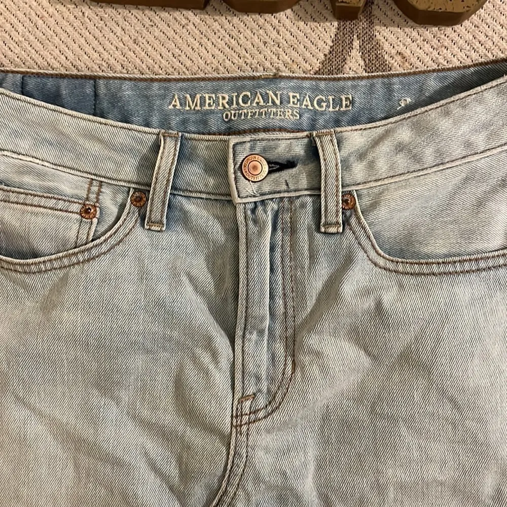 American Eagle Outfitters distressed light wash mini denim skirt - Image 8