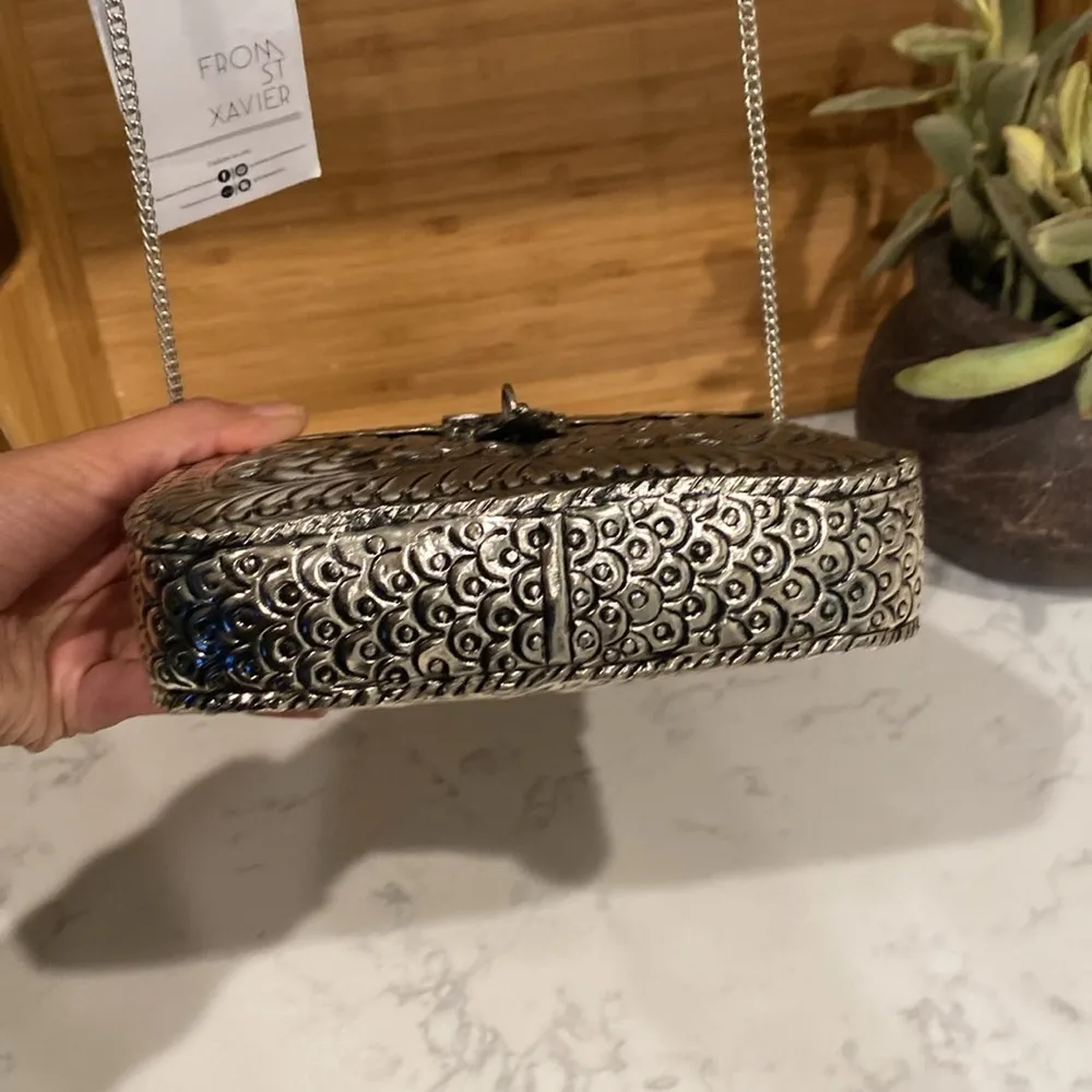 From St Xavier Riley Clutch silver tooled metal bag sold out on revolve - Image 5