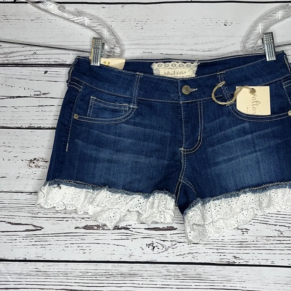 Altar’d State NWT Size 27/5 Jane Doe Wash Eyelet Lace Hemline Denim Jean Shorts - Image 2