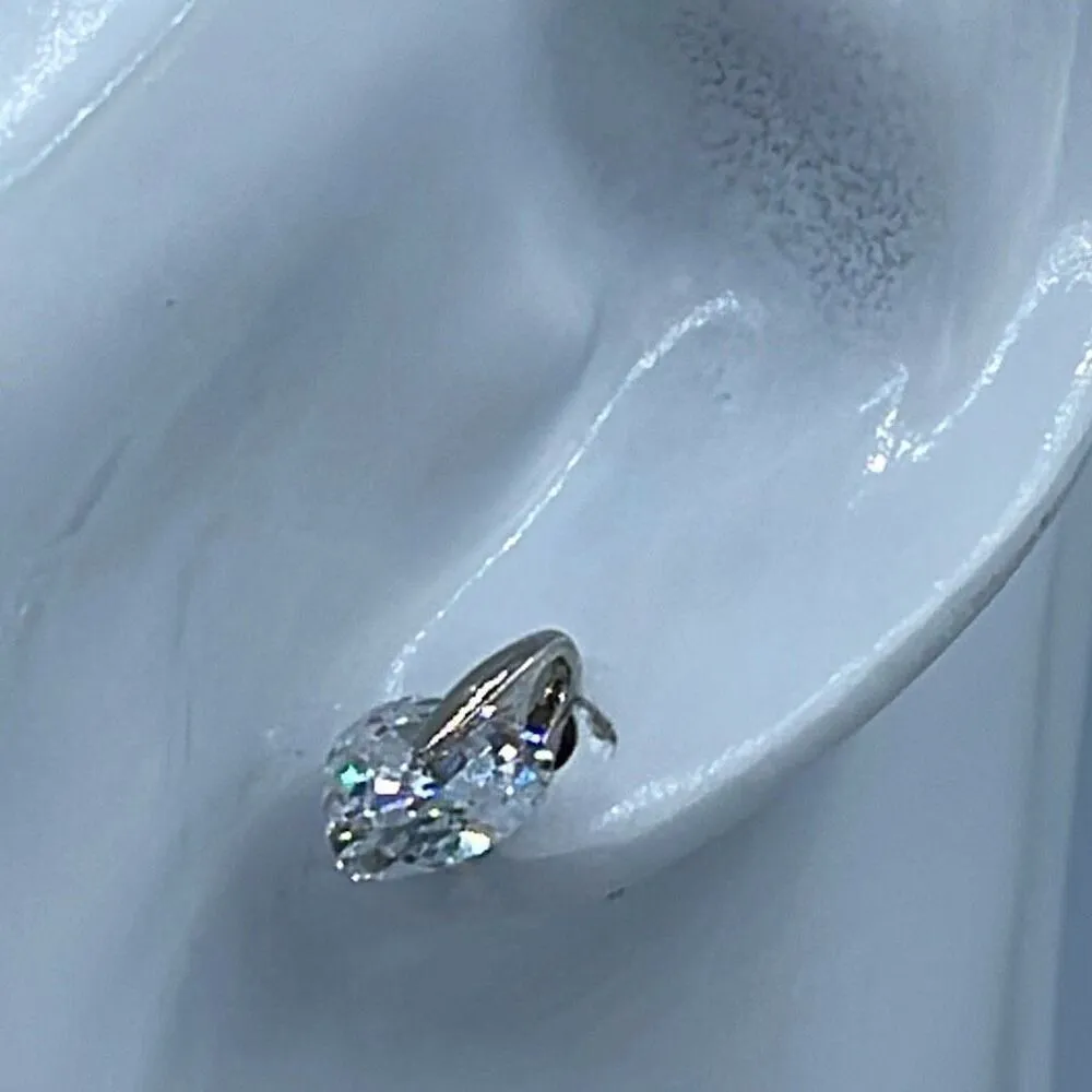 Heart crystals set in Rhodium plated earrings. - Image 5