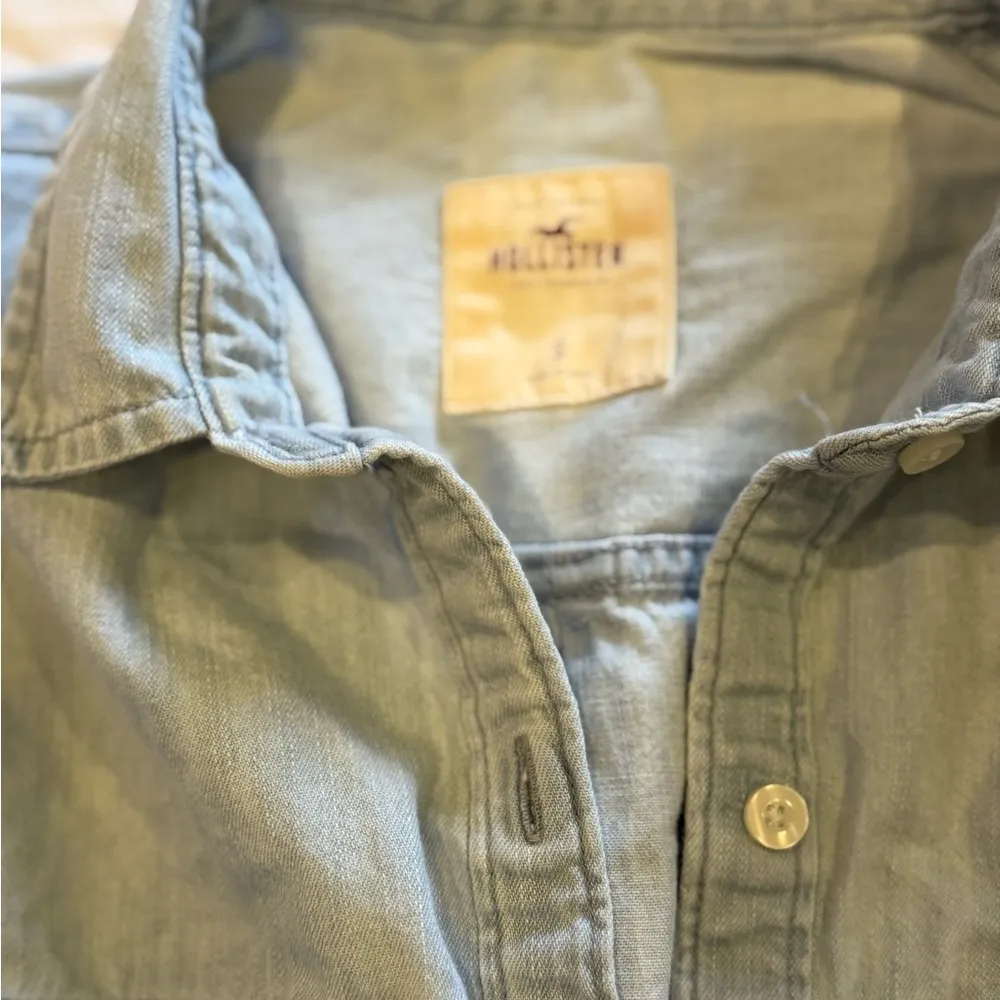 Hollister Light Blue Long Sleeve Jean top size small - Image 2