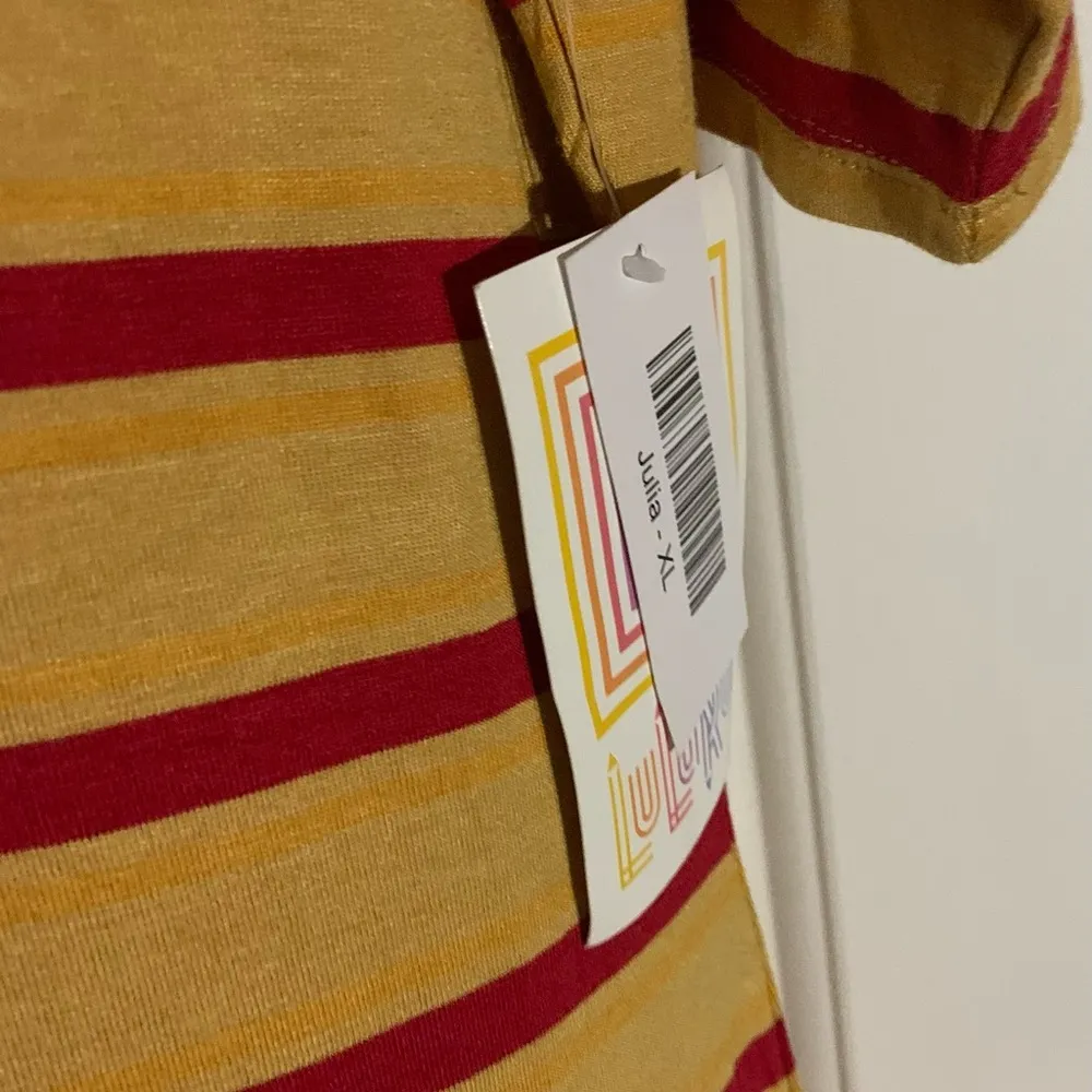 LuLaRoe Julia Dress Sz XL NWT
Gold and Red striped dress... love the bottom - Image 5