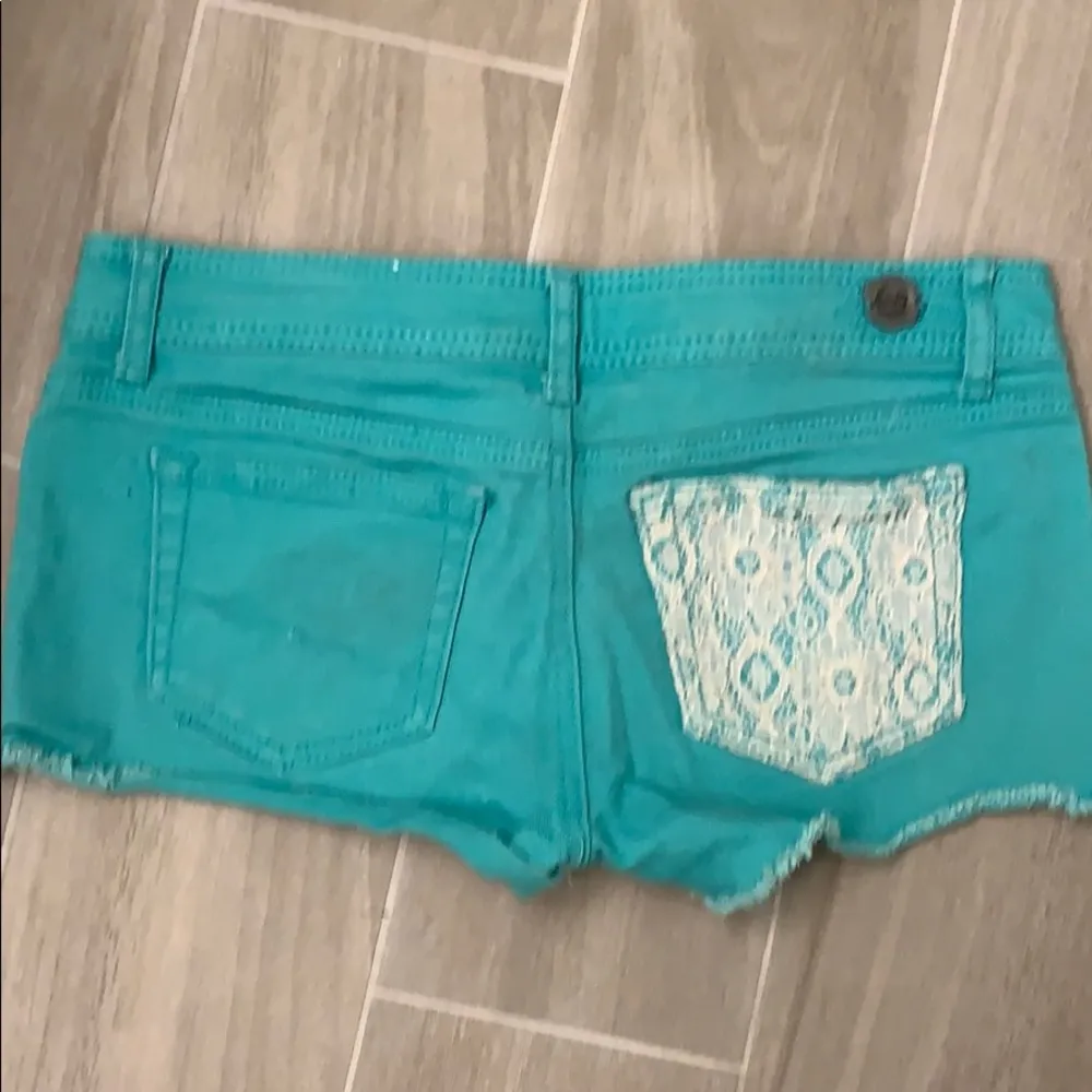 1st Kiss Turquoise Denim Shorts with Lace Overlay - Image 2